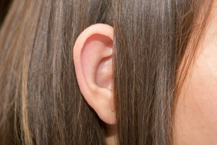 Ears,Protruding,From,Under,The,Hair,,Otolaryngologist,Treatment,Of,Diseases
