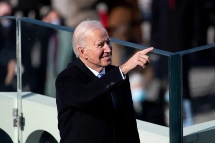 u-s-president-joe-biden-pointing-toward-attendees-at-his-2021-inauguration.JPG