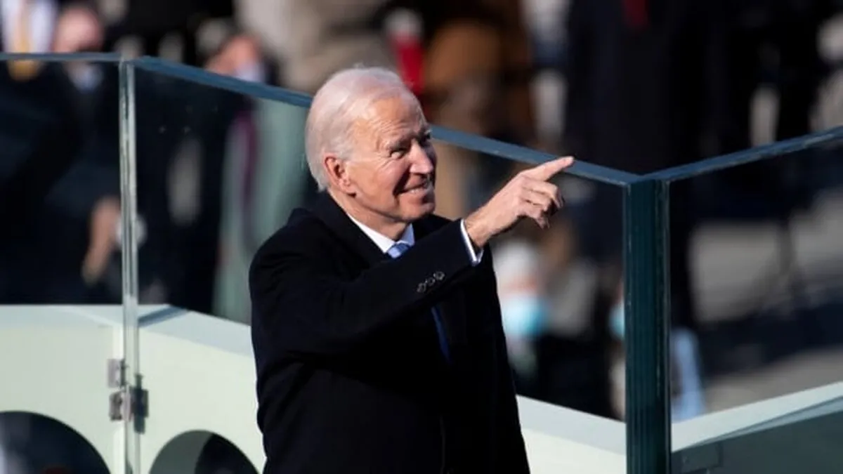 u-s-president-joe-biden-pointing-toward-attendees-at-his-2021-inauguration.JPG