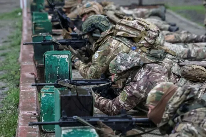 2023-04-20T130143Z_998728983_RC2AI0A1O2G6_RTRMADP_3_UKRAINE-CRISIS-KHARKIV-STORM-BRIGADE-1682072882.jpg