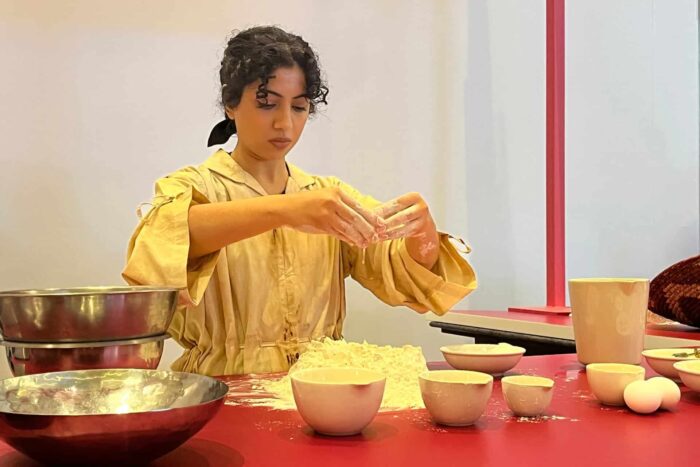 Almatrooshi during her performance The Alphabetics of the Baker at Art Dubai. Photo by Maghie Ghali