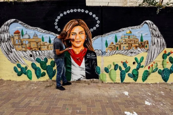 1683787103_2022-05-16T162509Z_1786131130_RC2G8U9S57I7_RTRMADP_3_ISRAEL-PALESTINIANS-JOURNALIST-MURAL.jpg
