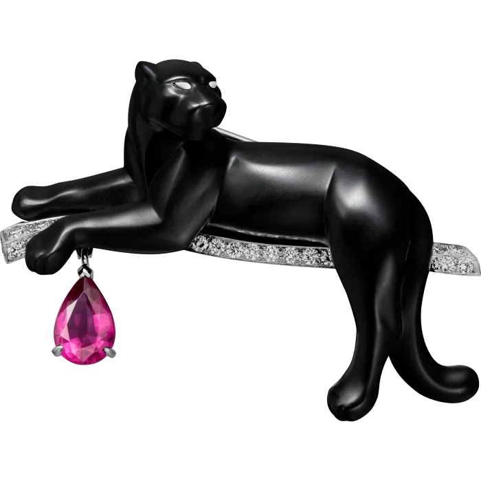 Broșă Cartier sculptată în nefrită neagră, aur alb, diamant și rubelit