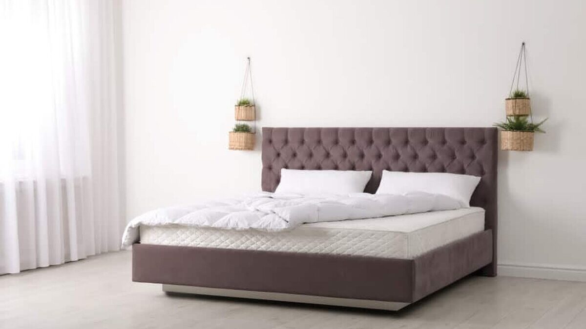 Comfortable,Bed,With,New,Mattress,Near,Wall,In,Room.,Healthy