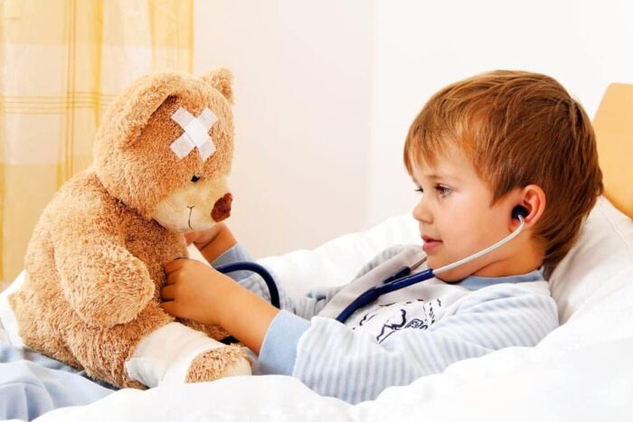 A,Sick,Child,Examined,Teddy,With,Stethoscope