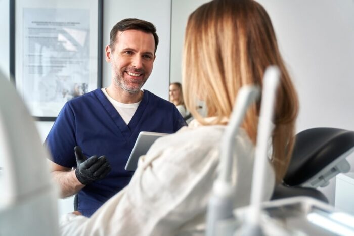 Consultation,Of,The,Dentist,And,The,Patient,In,The,Cabinet