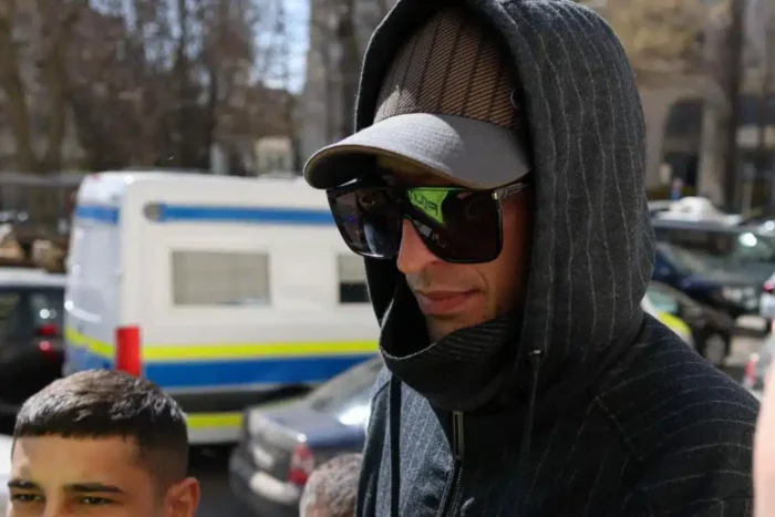 milionarul-bogdan-peschir-a-fost-adus-pentru-audieri-la-parchetul-general-a-venit-camuflat-cu-gluga.webp