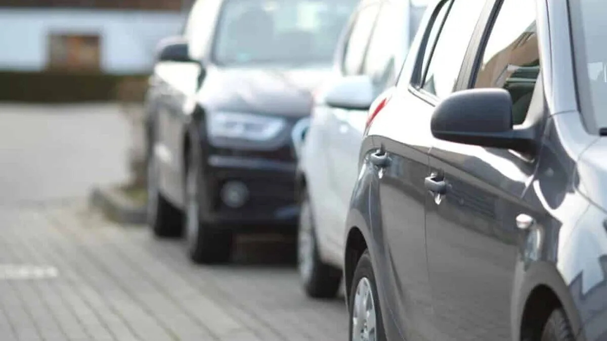 closeup-shot-black-car-parking-lot-with-blurred-background-1024x683.jpg