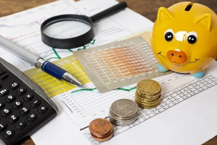 high-view-piggy-bank-piles-coins-1024x683.jpg