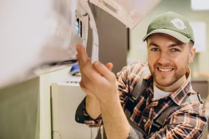 repairman-doing-air-conditioner-service-1024x683.jpg