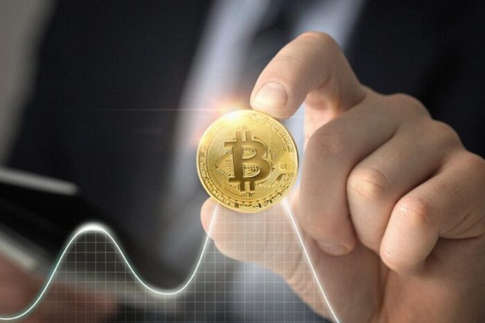 close-up-hand-holding-coin-1024x576.jpg