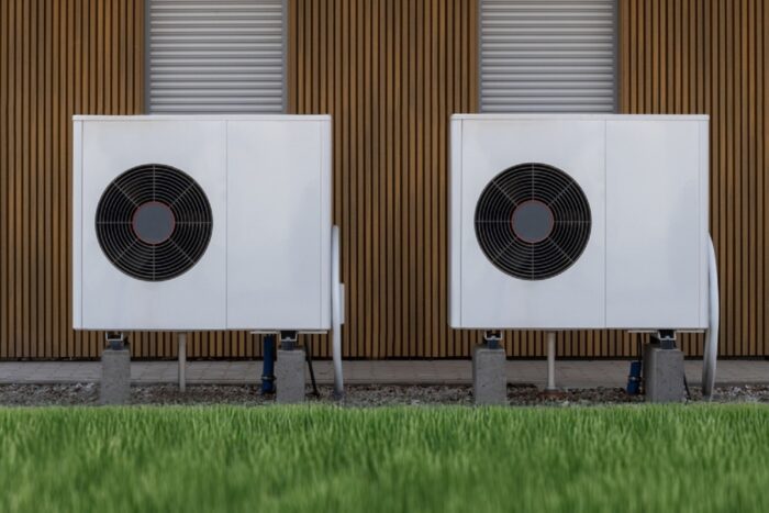 Outdoor,Heat,Pumps,On,Modern,Building,Wall