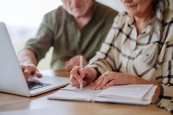 Close,Up,,Senior,Couple,Calculate,Expenses,Or,Planning,Budget,Together