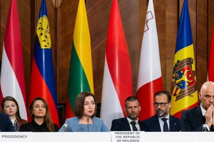 migranți